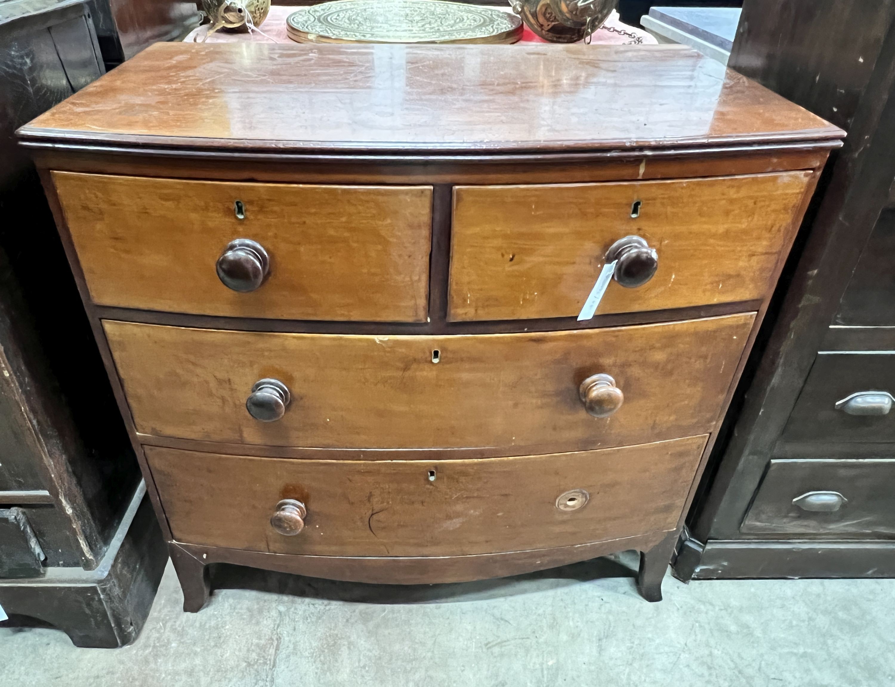 A small Regency mahogany four drawer bowfront chest, width 89cm, depth 50cm, height 87cm